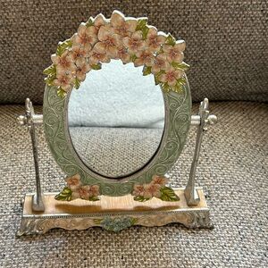 Vintage Vanity Mirror in heavy cast iron with enamel floral design.